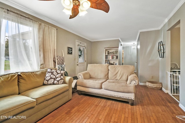 3341 Tabor Loop, Crossville, TN 38571 - living room with a ceiling fan, wood-type flooring, ornamental molding, and baseboards