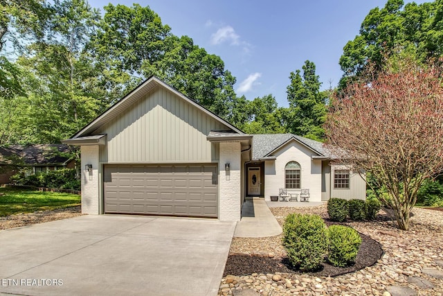 226 Oostanali Way, Loudon, TN 37774 - ranch-style home with an attached garage, concrete driveway, and brick siding