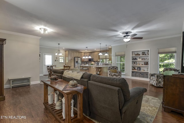 226 Oostanali Way, Loudon, TN 37774 - living area featuring ceiling fan, healthy amount of natural light, crown molding, dark wood-style floors, and baseboards