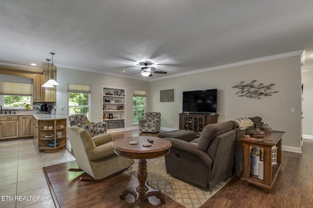 226 Oostanali Way, Loudon, TN 37774 - living room featuring ceiling fan, crown molding, built in features, and baseboards