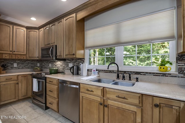226 Oostanali Way, Loudon, TN 37774 - kitchen with stainless steel appliances, a sink, backsplash, light tile patterned flooring, and light stone countertops