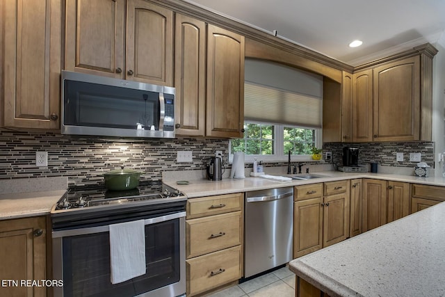 226 Oostanali Way, Loudon, TN 37774 - kitchen featuring stainless steel appliances, a sink, decorative backsplash, light tile patterned floors, and light stone counters