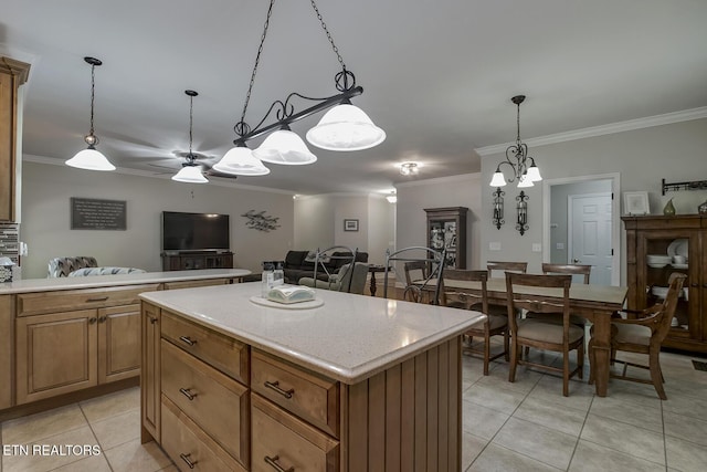 226 Oostanali Way, Loudon, TN 37774 - kitchen with light tile patterned floors, a ceiling fan, ornamental molding, light countertops, and decorative light fixtures