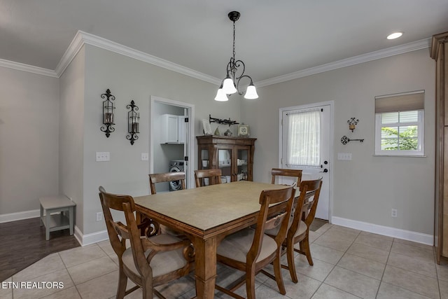 226 Oostanali Way, Loudon, TN 37774 - dining space featuring crown molding, light tile patterned flooring, baseboards, and a chandelier
