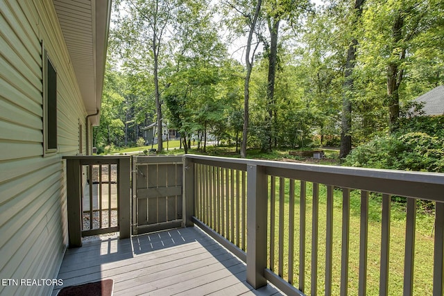 226 Oostanali Way, Loudon, TN 37774 - wooden deck with view of wooded area