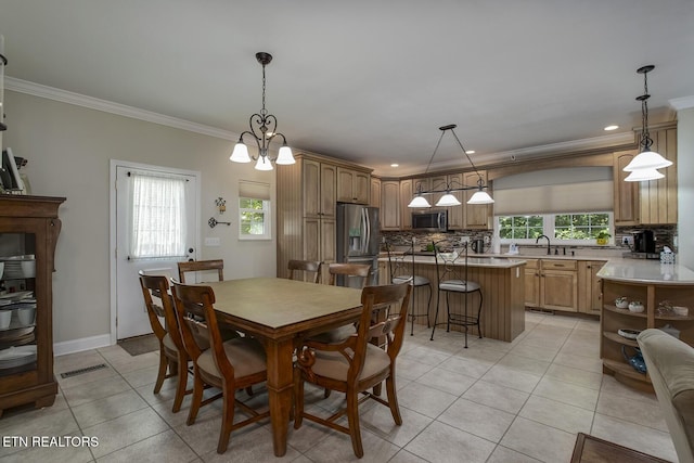 226 Oostanali Way, Loudon, TN 37774 - dining room featuring light tile patterned floors, crown molding, recessed lighting, a chandelier, and baseboards