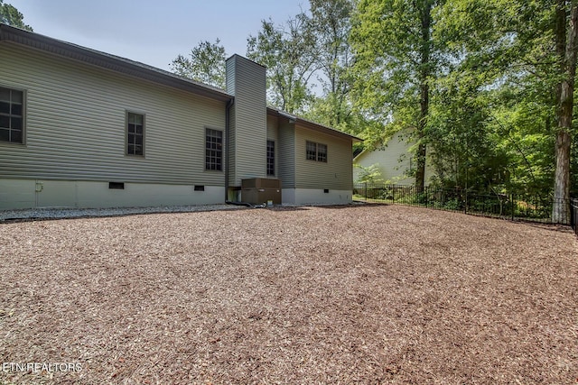 226 Oostanali Way, Loudon, TN 37774 - back of property featuring crawl space and a chimney
