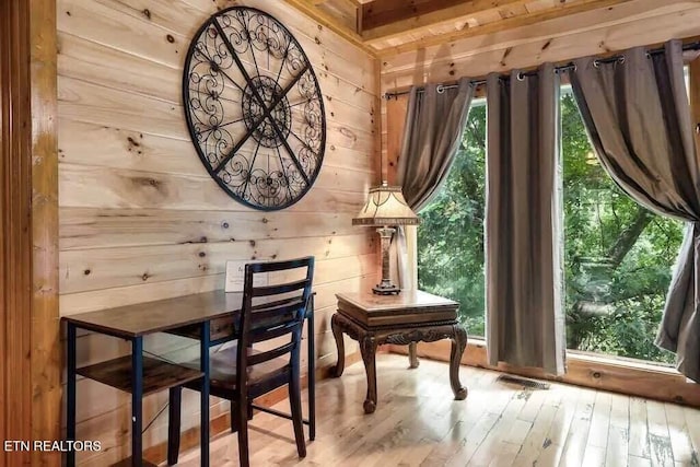 1056 Black Bear Cub Way, Sevierville, TN 37862 - dining area featuring wooden walls and hardwood / wood-style flooring
