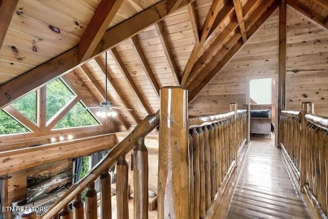 1056 Black Bear Cub Way, Sevierville, TN 37862 - hallway with wooden ceiling, wood walls, hardwood / wood-style floors, and an upstairs landing