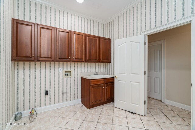 920 Harbor Pointe Way, Knoxville, TN 37922 - laundry room featuring hookup for a washing machine, cabinet space, light tile patterned floors, baseboards, and crown molding