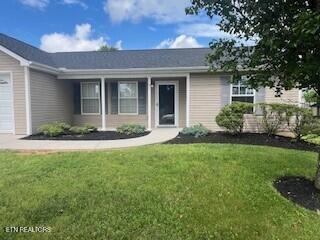 6206 Jim Fox Ln, Powell, TN 37849 - single story home featuring a garage and a front lawn