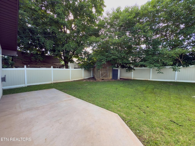 104 Church St, Loudon, TN 37774 - fenced backyard with a patio and a storage shed