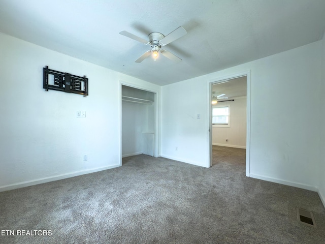 104 Church St, Loudon, TN 37774 - unfurnished bedroom featuring carpet, a closet, and a ceiling fan