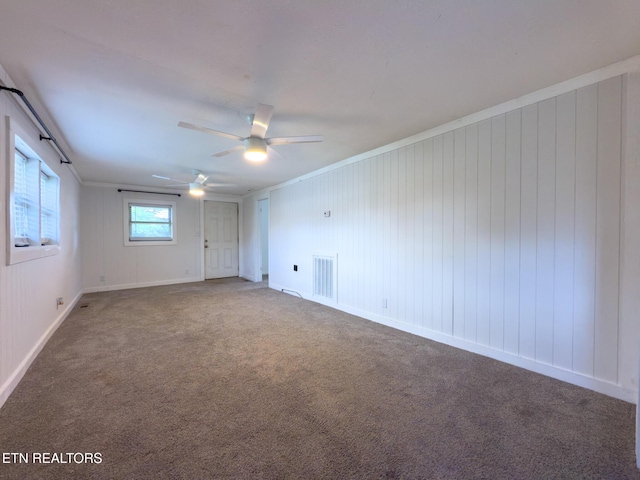 104 Church St, Loudon, TN 37774 - empty room featuring ceiling fan, carpet floors, and ornamental molding