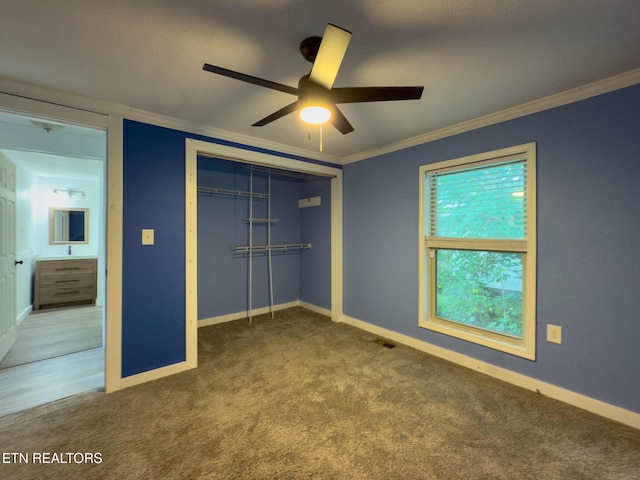 104 Church St, Loudon, TN 37774 - unfurnished bedroom featuring carpet floors, crown molding, a closet, and ceiling fan
