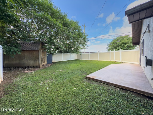 104 Church St, Loudon, TN 37774 - fenced backyard with a shed and a patio area