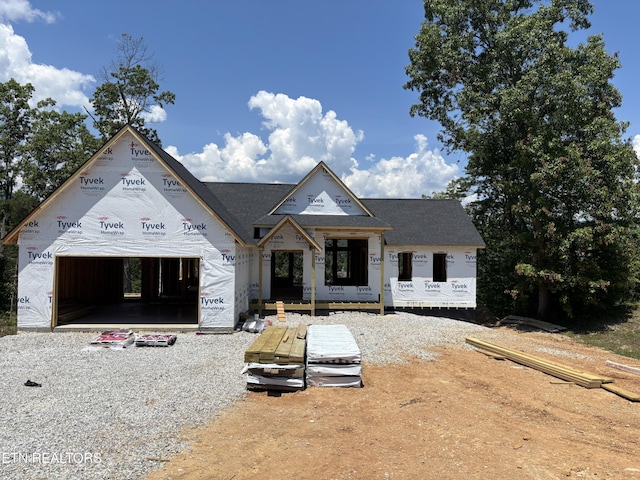 300 Bluff Trce, Jacksboro, TN 37757 - unfinished property featuring a garage