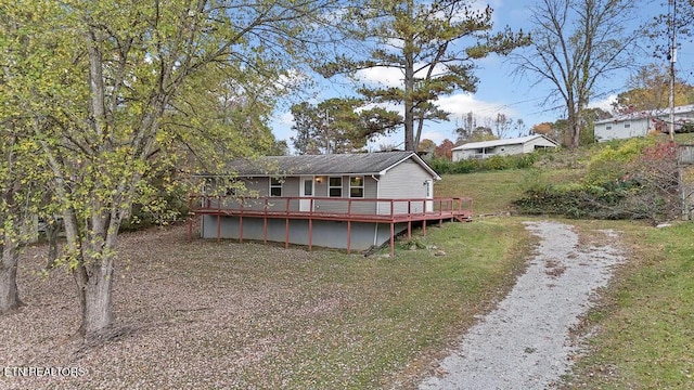 317 Hollifield Dr, Jacksboro, TN 37757 - view of front of home featuring a wooden deck