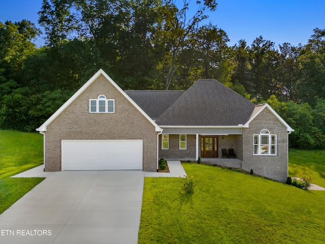 4153 Harbor View Dr, Morristown, TN 37814 - view of front of property with driveway, a front lawn, and brick siding