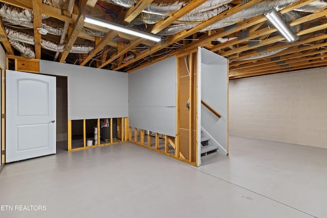 4153 Harbor View Dr, Morristown, TN 37814 - unfinished basement with stairway and concrete block wall