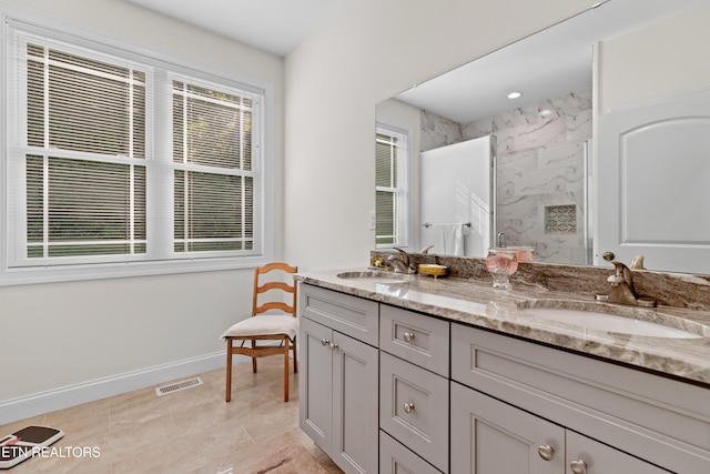 4153 Harbor View Dr, Morristown, TN 37814 - full bath with double vanity, a marble finish shower, and baseboards