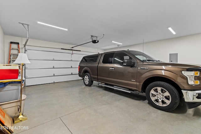 4153 Harbor View Dr, Morristown, TN 37814 - garage with a garage door opener and electric panel