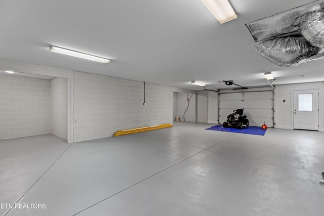 4153 Harbor View Dr, Morristown, TN 37814 - garage with a garage door opener and concrete block wall