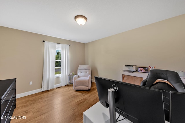 142 Breezy Ln, New Tazewell, TN 37825 - home office featuring light wood-style floors and baseboards