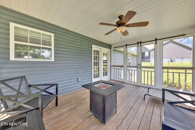 142 Breezy Ln, New Tazewell, TN 37825 - unfurnished sunroom with an outdoor fire pit and ceiling fan