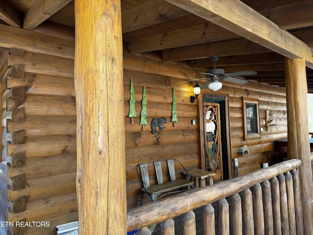 2738 Murray Ridge Rd, Sevierville, TN 37876 - detailed view of a ceiling fan and rustic walls