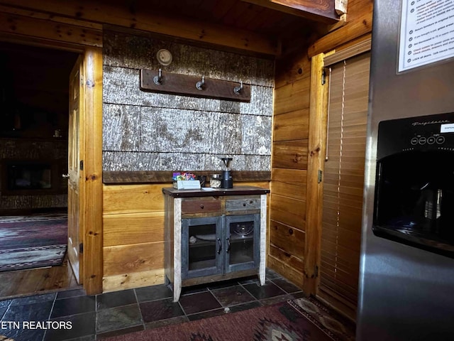 2738 Murray Ridge Rd, Sevierville, TN 37876 - bar featuring a fireplace and stainless steel fridge
