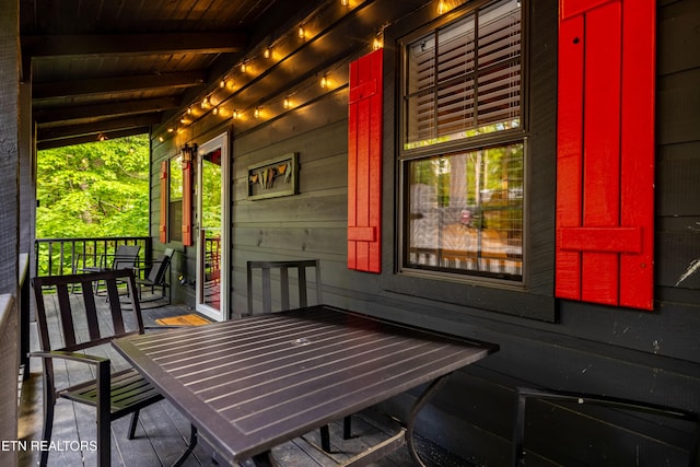 391 Laurel Rd, Townsend, TN 37882 - covered porch featuring outdoor dining space
