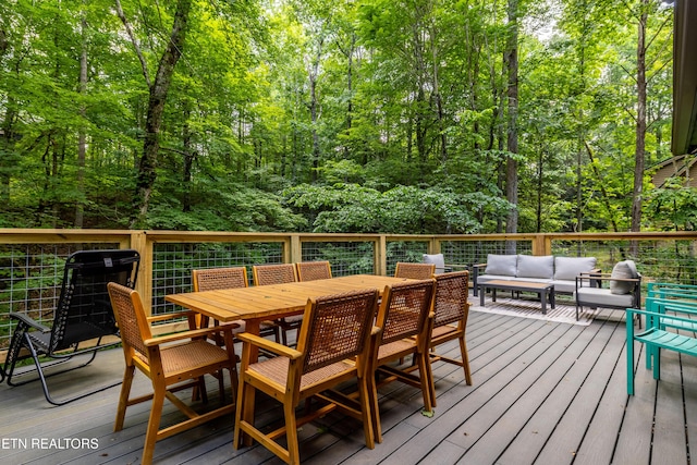 391 Laurel Rd, Townsend, TN 37882 - deck with outdoor lounge area, outdoor dining space, and a forest view