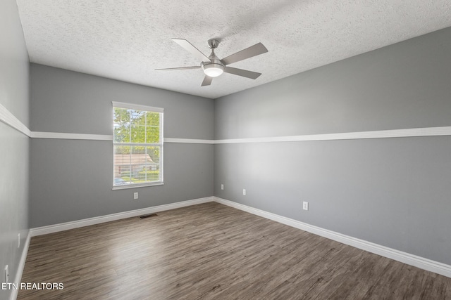 1720 Chesapeake Dr, Athens, TN 37303 - spare room featuring wood finished floors, a ceiling fan, baseboards, and a textured ceiling