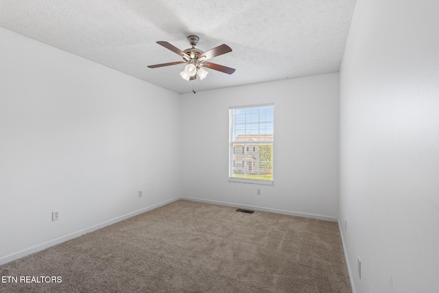 1720 Chesapeake Dr, Athens, TN 37303 - empty room with carpet flooring, ceiling fan, a textured ceiling, and baseboards