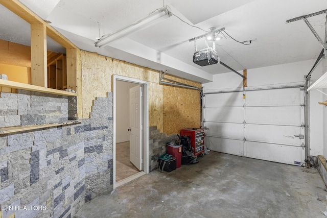1720 Chesapeake Dr, Athens, TN 37303 - garage featuring a garage door opener