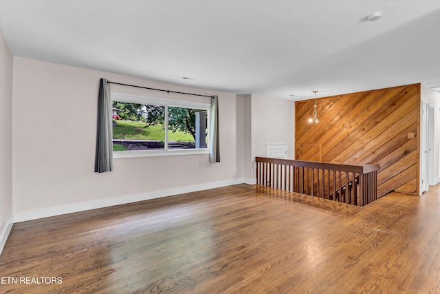9209 Topoco Dr, Knoxville, TN 37922 - spare room featuring wood finished floors and a smoke detector