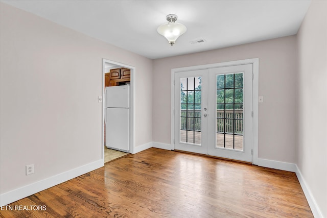 9209 Topoco Dr, Knoxville, TN 37922 - unfurnished room featuring french doors and light wood finished floors