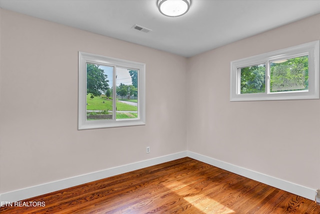 9209 Topoco Dr, Knoxville, TN 37922 - empty room featuring plenty of natural light and wood finished floors