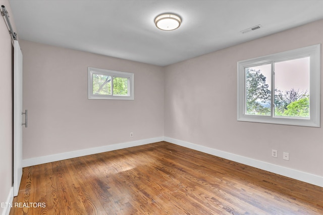 9209 Topoco Dr, Knoxville, TN 37922 - unfurnished room with baseboards and wood finished floors