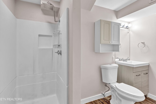 9209 Topoco Dr, Knoxville, TN 37922 - full bath with a shower, wood finished floors, and vanity