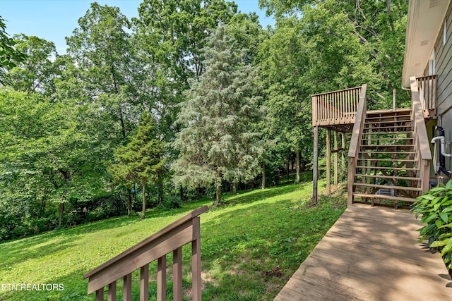 9209 Topoco Dr, Knoxville, TN 37922 - view of green lawn with stairway and a deck