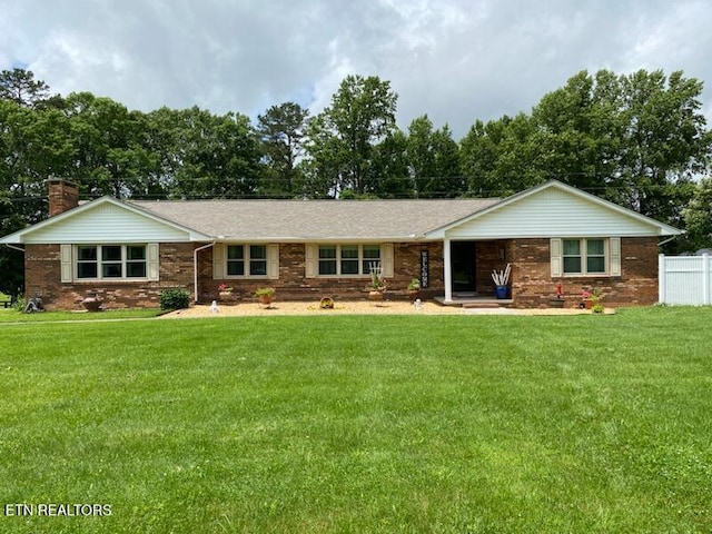 1922 Chaney Ridge Rd, London, KY 40741 - ranch-style home featuring brick siding, a chimney, and view of scattered trees