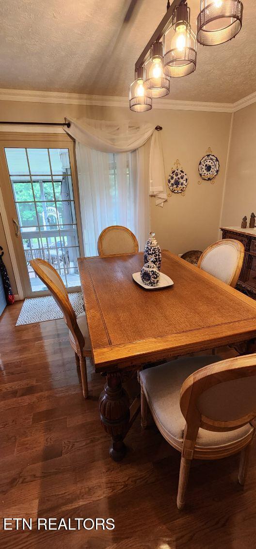 1922 Chaney Ridge Rd, London, KY 40741 - dining area featuring a textured ceiling, wood finished floors, and crown molding