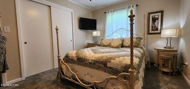 1922 Chaney Ridge Rd, London, KY 40741 - bedroom featuring dark carpet, ornamental molding, and a closet