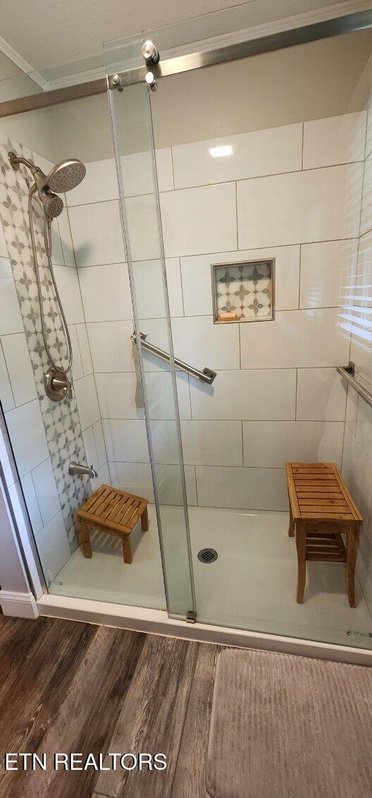 1922 Chaney Ridge Rd, London, KY 40741 - full bath featuring a stall shower and wood finished floors