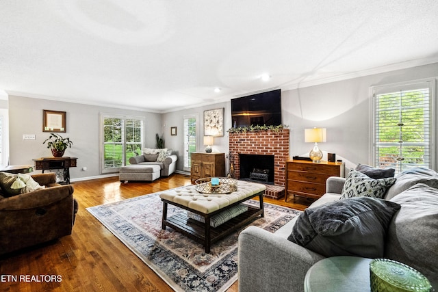 10513 River Ridge Rd, Knoxville, TN 37922 - living area featuring crown molding, wood finished floors, a fireplace, and recessed lighting