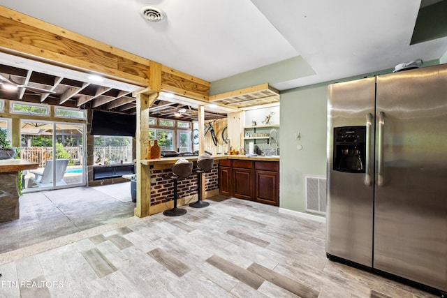 10513 River Ridge Rd, Knoxville, TN 37922 - kitchen featuring stainless steel refrigerator with ice dispenser and light countertops
