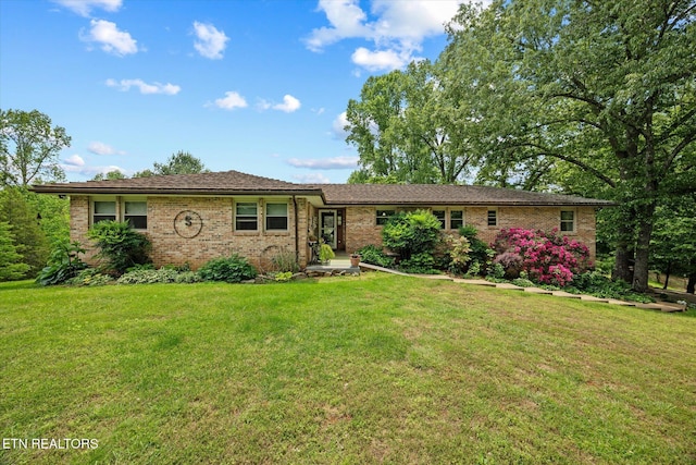 2059 Bolestown Loop, Alpine, TN 38543 - single story home with brick siding and a front yard