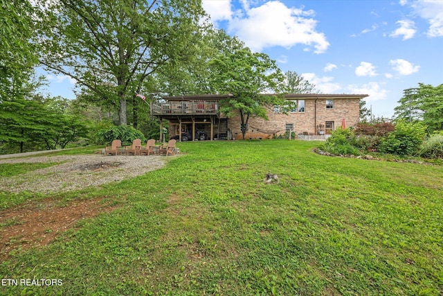 2059 Bolestown Loop, Alpine, TN 38543 - view of green lawn with a wooden deck and stairway